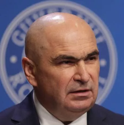 Premierul Ilie Bolojan Despre Criza Financiară a României: „Plătim Dobânzi Nesuportabile”